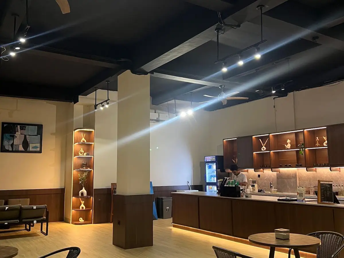 The café counter and lounge at The Royale Padel